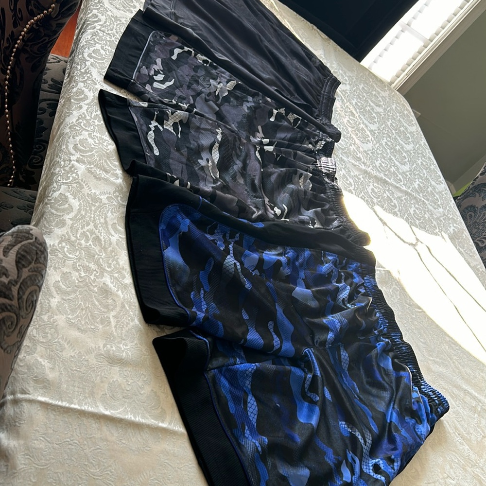 Basketball shorts. AND1 2 camo print and 1 grey black pair. Men’s L. Great shape